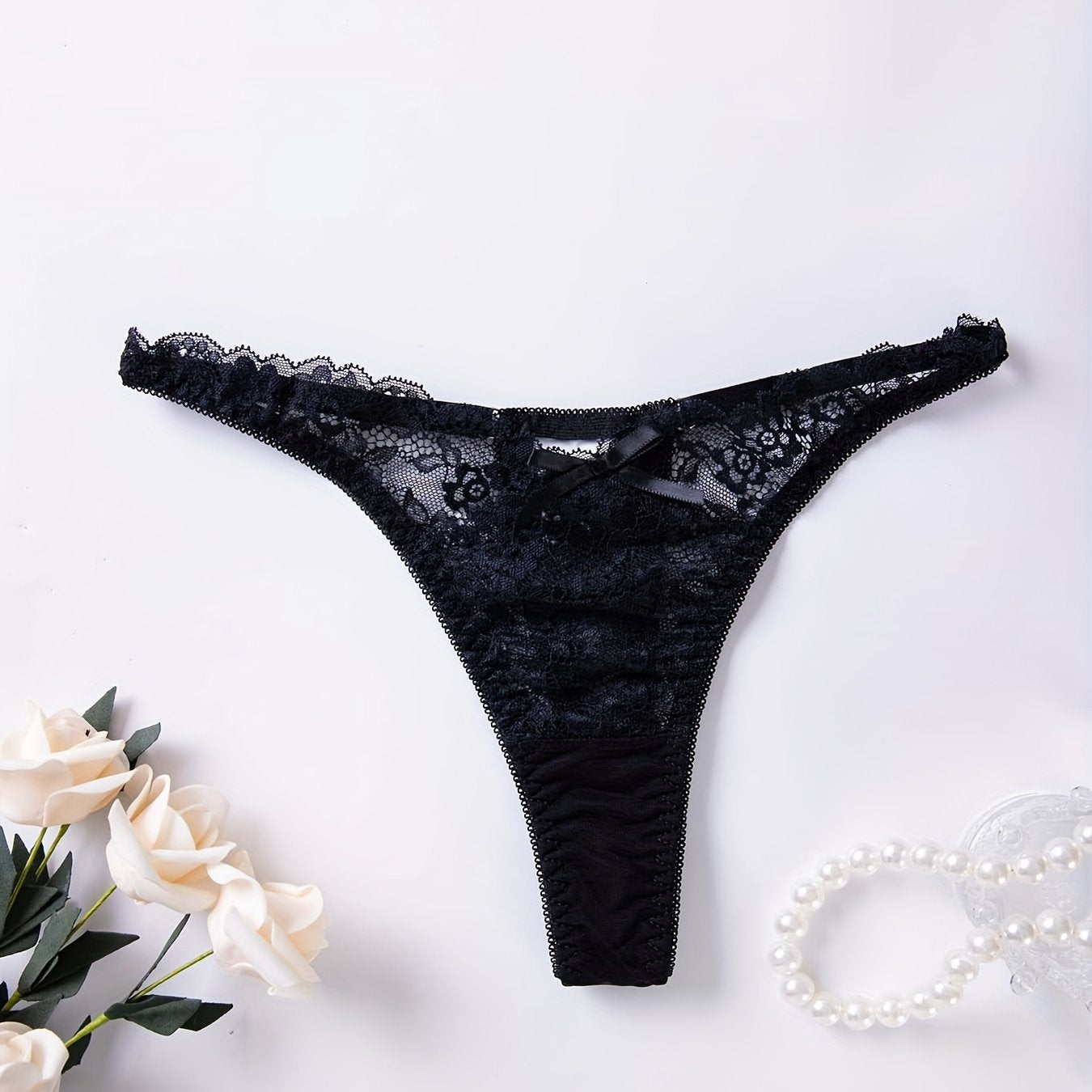 Women's sexy lingerie and underwear, featuring floral lace thongs and low waist bow tie panties with cut-out details.