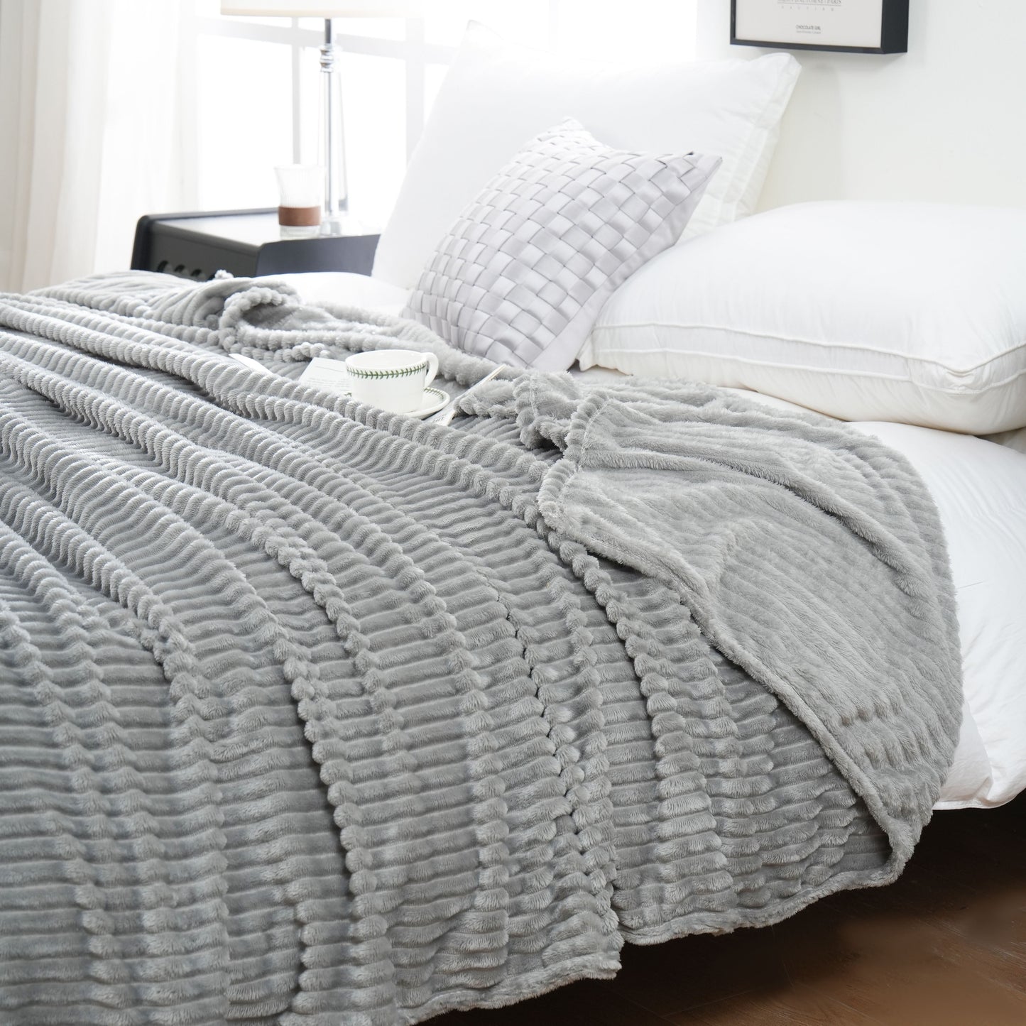 Enjoy the cozy comfort of our 1 piece 220GSM Flannel Throw Blanket, featuring a soft and warm ribbed design available in Beige, Gray, Black, or White. Perfect for all seasons, this blanket is ideal for use in the bedroom, sofa, office, or even for your