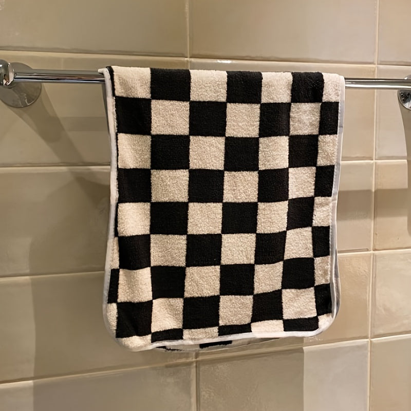 Soft skin face towel in checkerboard pattern, absorbent and comfortable for bathroom, gym, and kitchen.