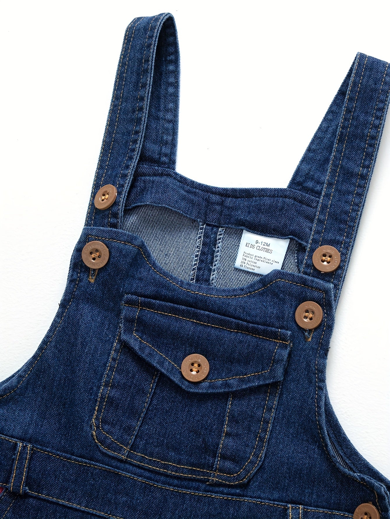 Children's denim overalls with embroidered animal designs, made of a cotton blend with slight stretch, suitable for outdoor wear in the spring and fall.