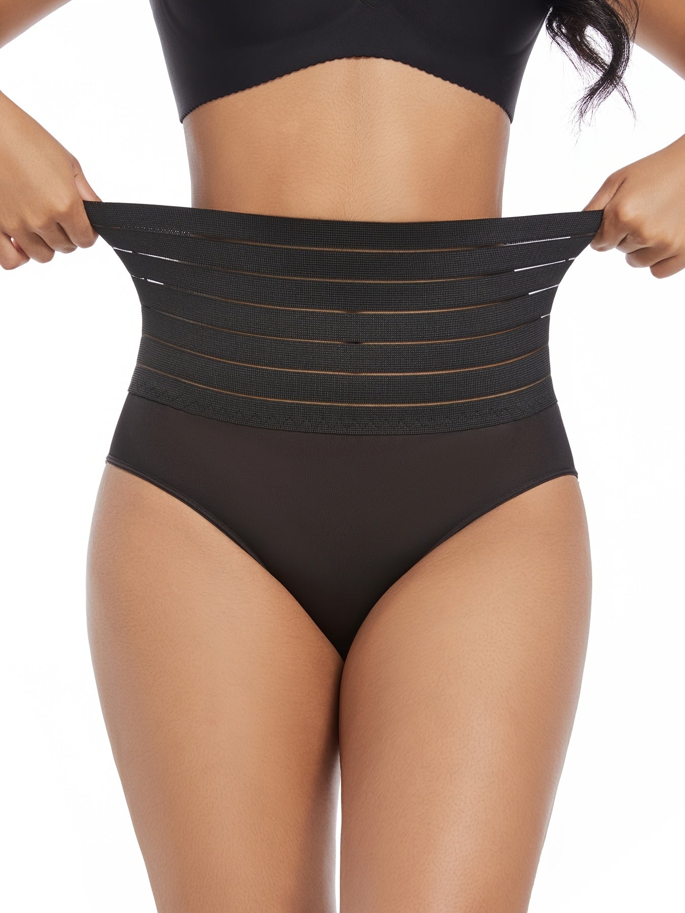 High-waist tummy control shapewear panties for women in black. Comfortable and breathable with no rolling. Made of stretchy nylon and elastane blend. Hand wash or dry clean. Ideal for