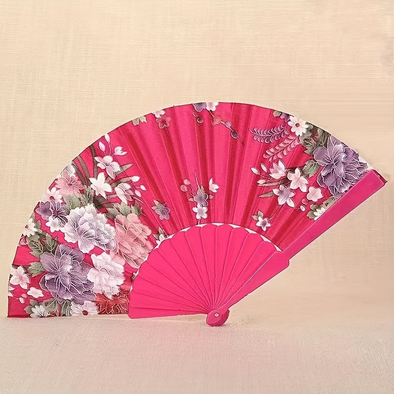 Silk fabric foldable fan for women - suitable for dancing, gifting, square dancing, or as an antique fan - made of high-quality plastic material.