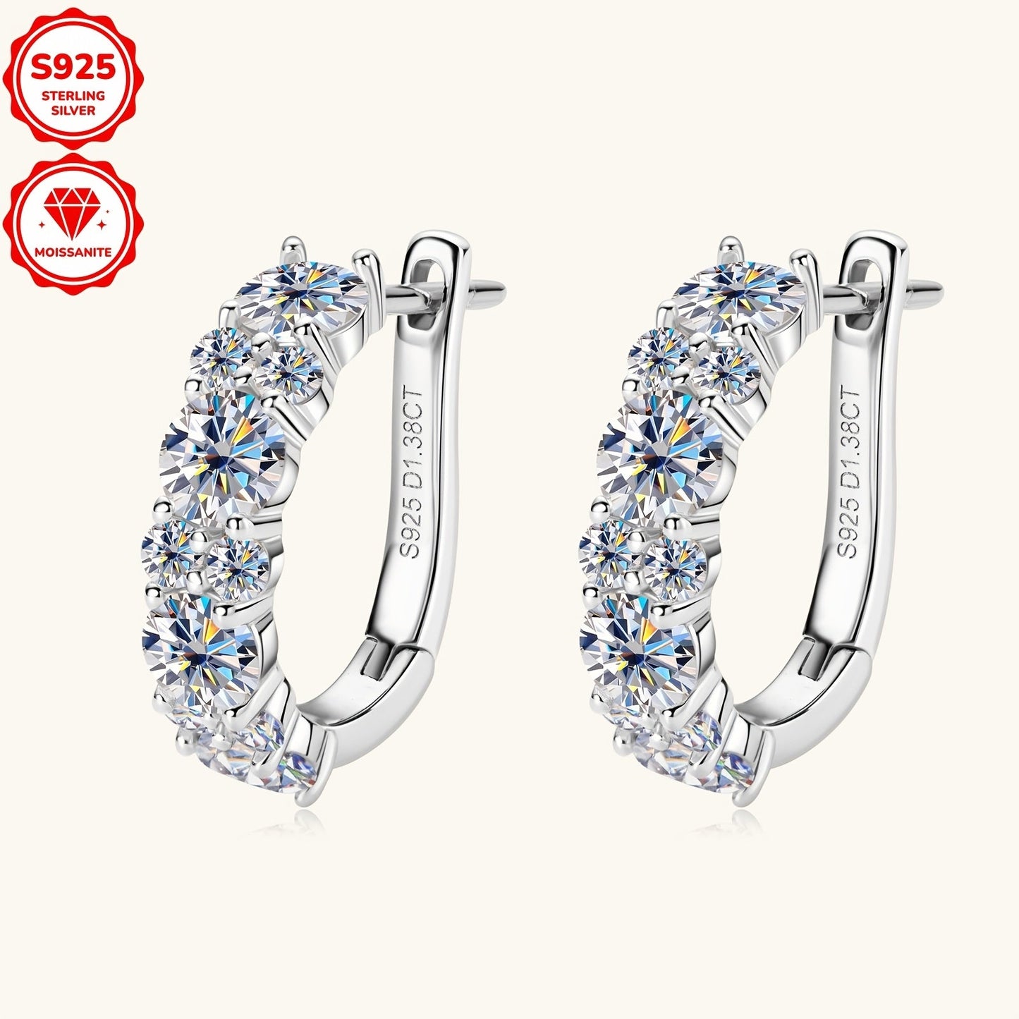 Elegant and luxurious, these hoop earrings are made of 925 sterling silver plated with synthetic moissanite stones. With a 14K golden finish, these earrings feature a total silver weight of 2.36g and are adorned with 4mm and 2mm stones totaling 1.38ctw.