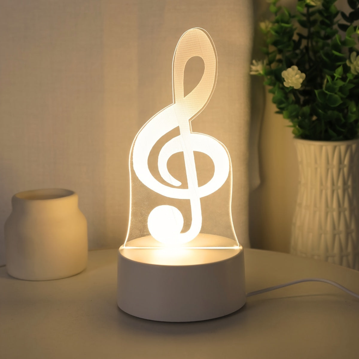 USB-powered 3D music note night light, perfect for bedroom decor. Ideal gift for boys and girls on birthdays or holidays.