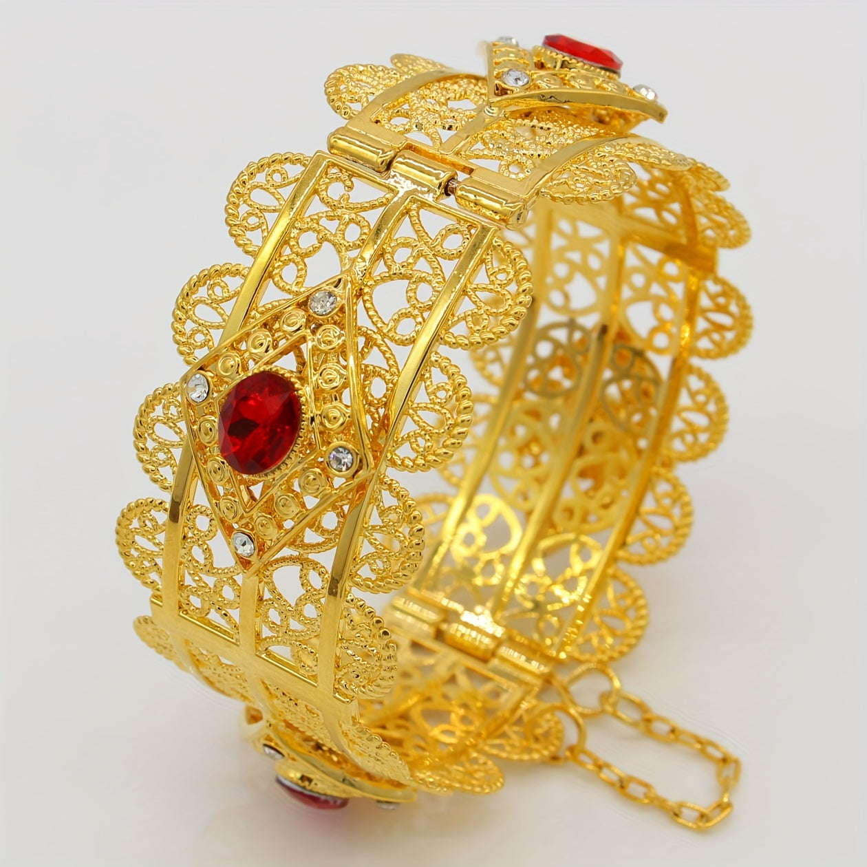 Elegant Arabian-inspired 18K Gold Plated Hollow-Out Cuff Bangle adorned with Synthetic Cubic Zirconia - Adjustable Open Bracelet perfect for Women, suitable for both everyday wear and special occasions like weddings.