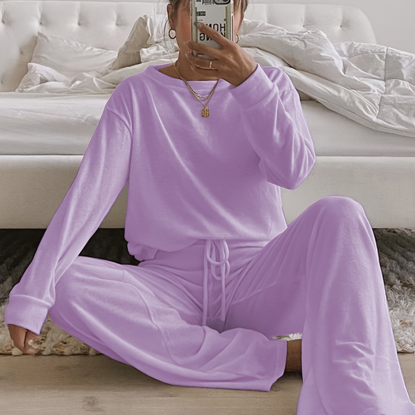 Cozy women's loungewear set in brushed fabric, solid color, round neck, long pants suit made of polyester for adults in autumn/winter season.