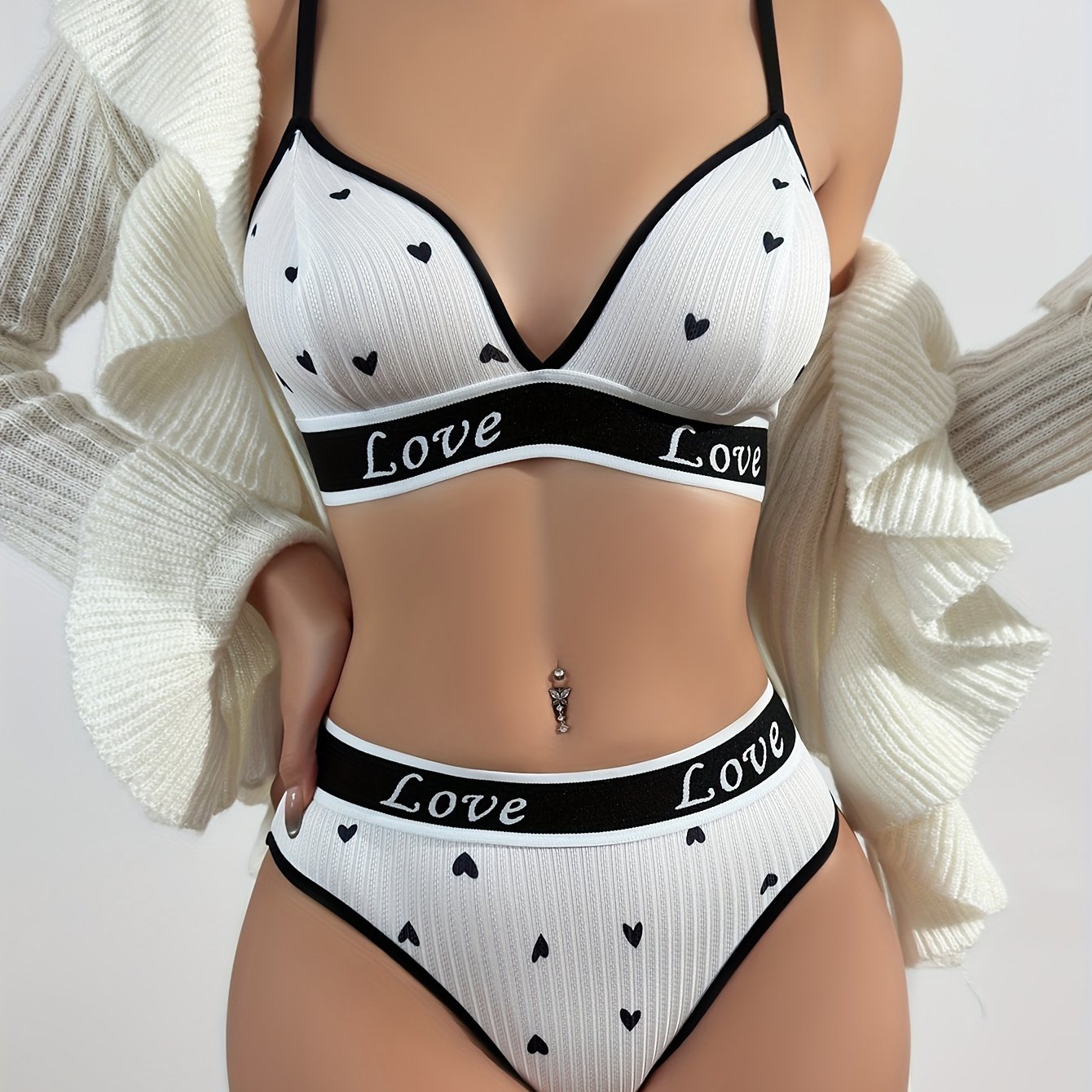 Women's cute cartoon lingerie set made from 90% polyester and 10% elastane. Includes letter and lip print bikini and triangle panties. Skin-friendly and comfortable knit fabric.