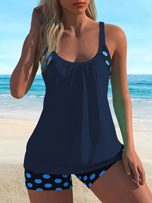 Women's navy blue tankini with conservative split skirt for fashionably covering the belly.