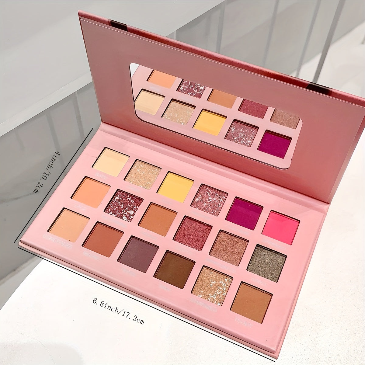 18-Color Desert Rose Eyeshadow Palette with various finishes for festivals, parties, and music events.