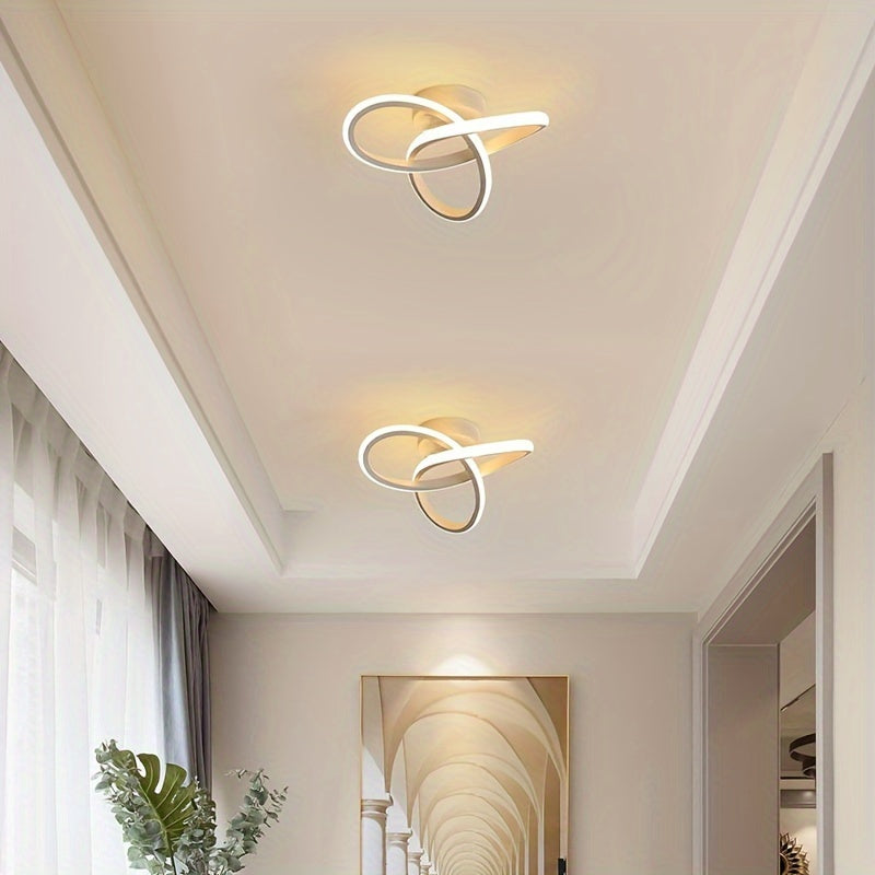 LED ceiling light fixture with modern knot design in black and white metal, providing warm ambient glow. Ideal for home and office decor, contemporary and sleek design.