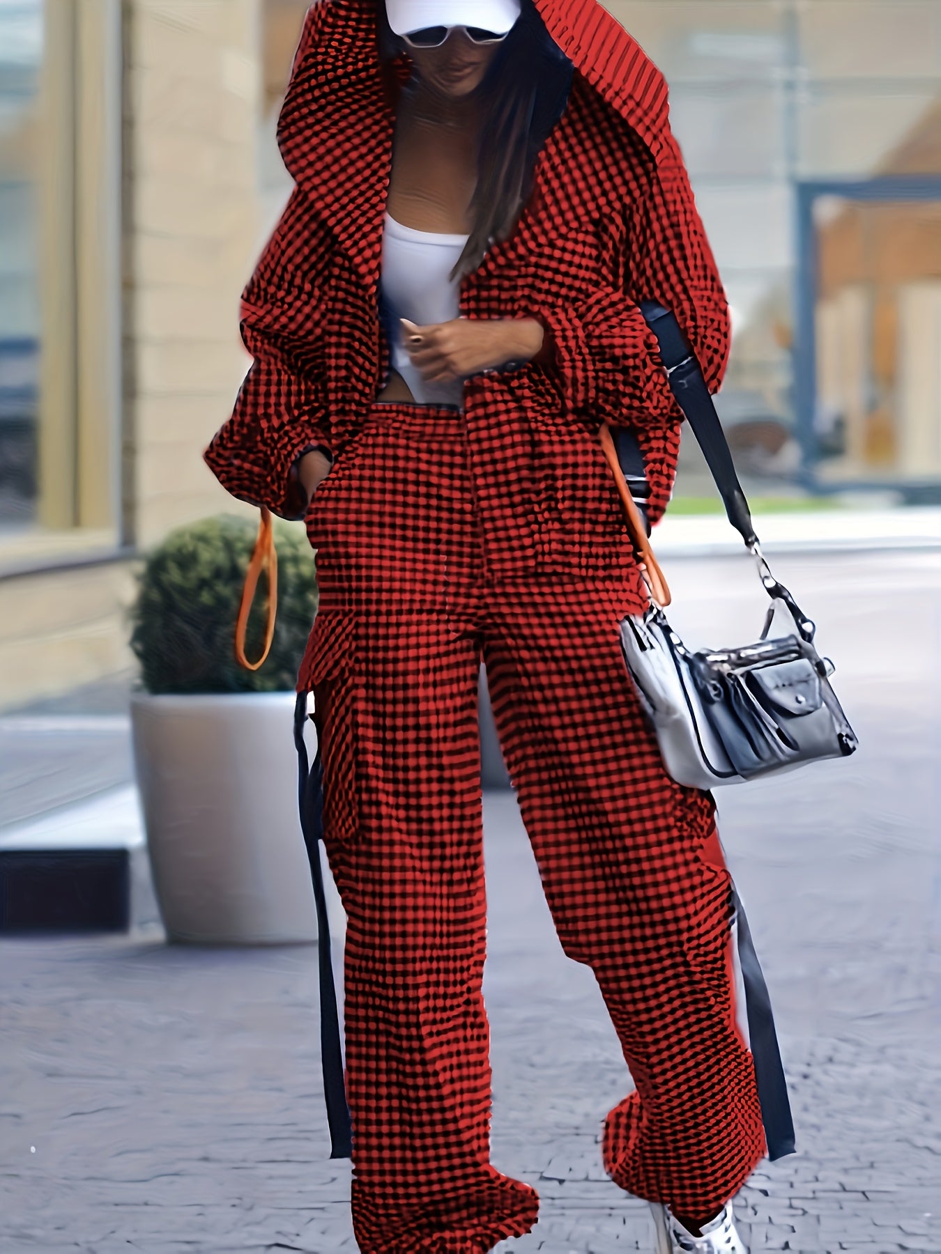 Casual gingham pantsuit for women, with lapel collar and zipper details, made of 100% polyester woven fabric, ideal for fall/winter.