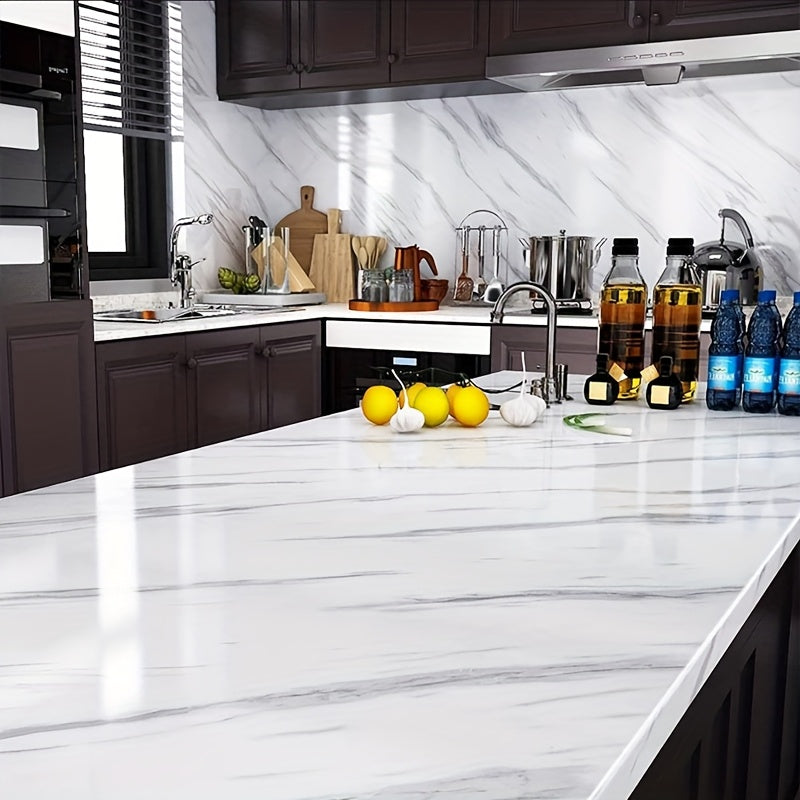 White marble self-adhesive kitchen backsplash wallpaper is oil, heat, waterproof, and mold resistant, perfect for cabinets, stovetops, and countertops. Easy to install stove top protectors.