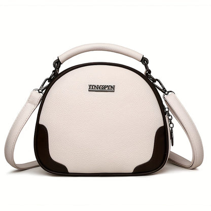 Women's crossbody bag with dual zipper compartments, made of synthetic material, with detachable strap, charming letter design, lightweight, polyester lining, and wrist pouch included.