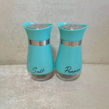 1 set of 4 ounce glass salt and pepper jars with stainless steel lids, perfect for kitchens, tables, RVs, campsites, and barbecues. Refillable design.