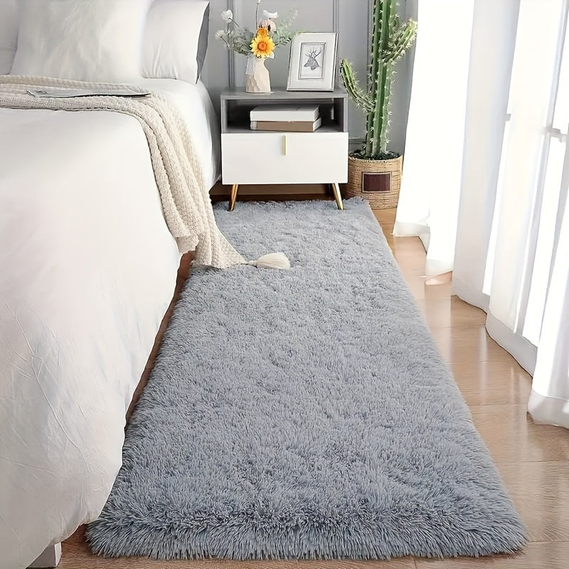 Transform your living space with the luxurious and ultra-soft PV velvet shag area rug. This plush and stain-resistant carpet is perfect for adding warmth and style to your living room, bedroom, or dorm decor. With its non-slip design, it is perfect for