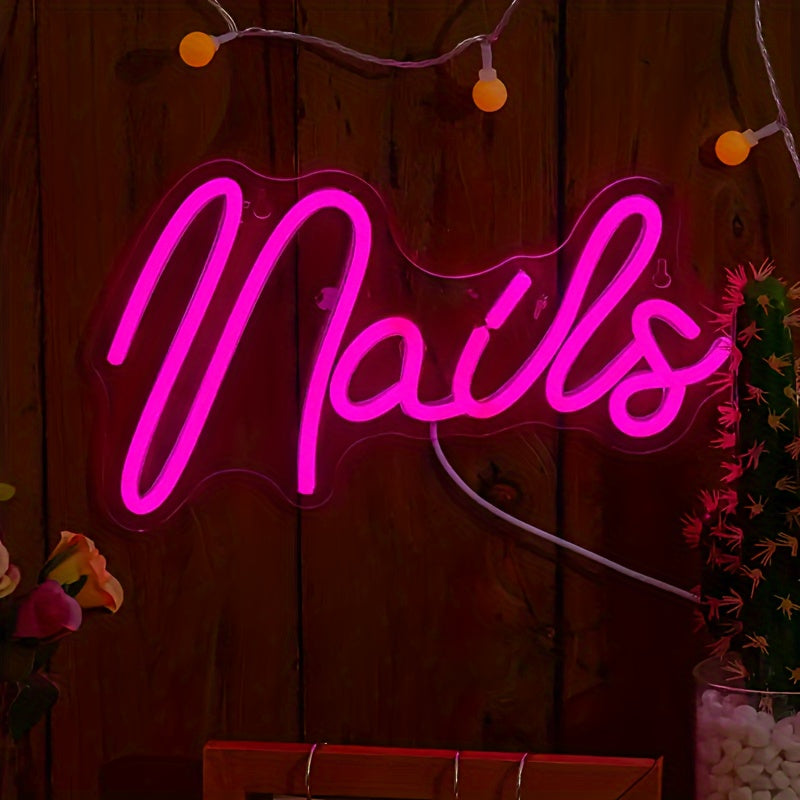 Neon light sign for home, nails studio, or salon featuring creative letter design.