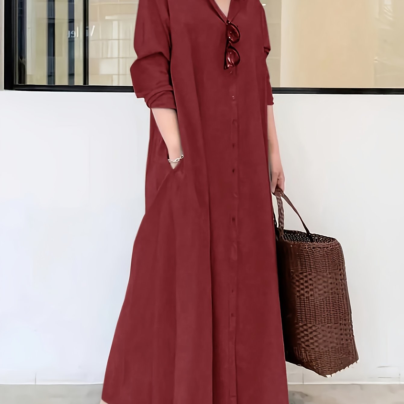 Button front shirt dress in solid color, loose fit maxi style with long sleeves for spring and fall.