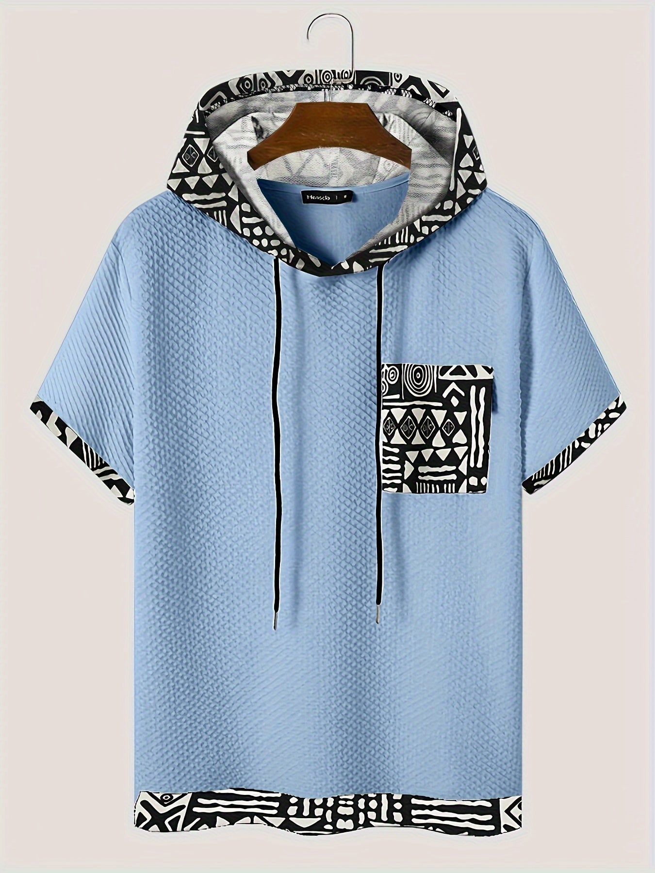 Men's plus size casual hooded t-shirt with geometric print, made from lightweight polyester fabric in gray with black and white patterns. Includes drawstring hood for comfortable fit and