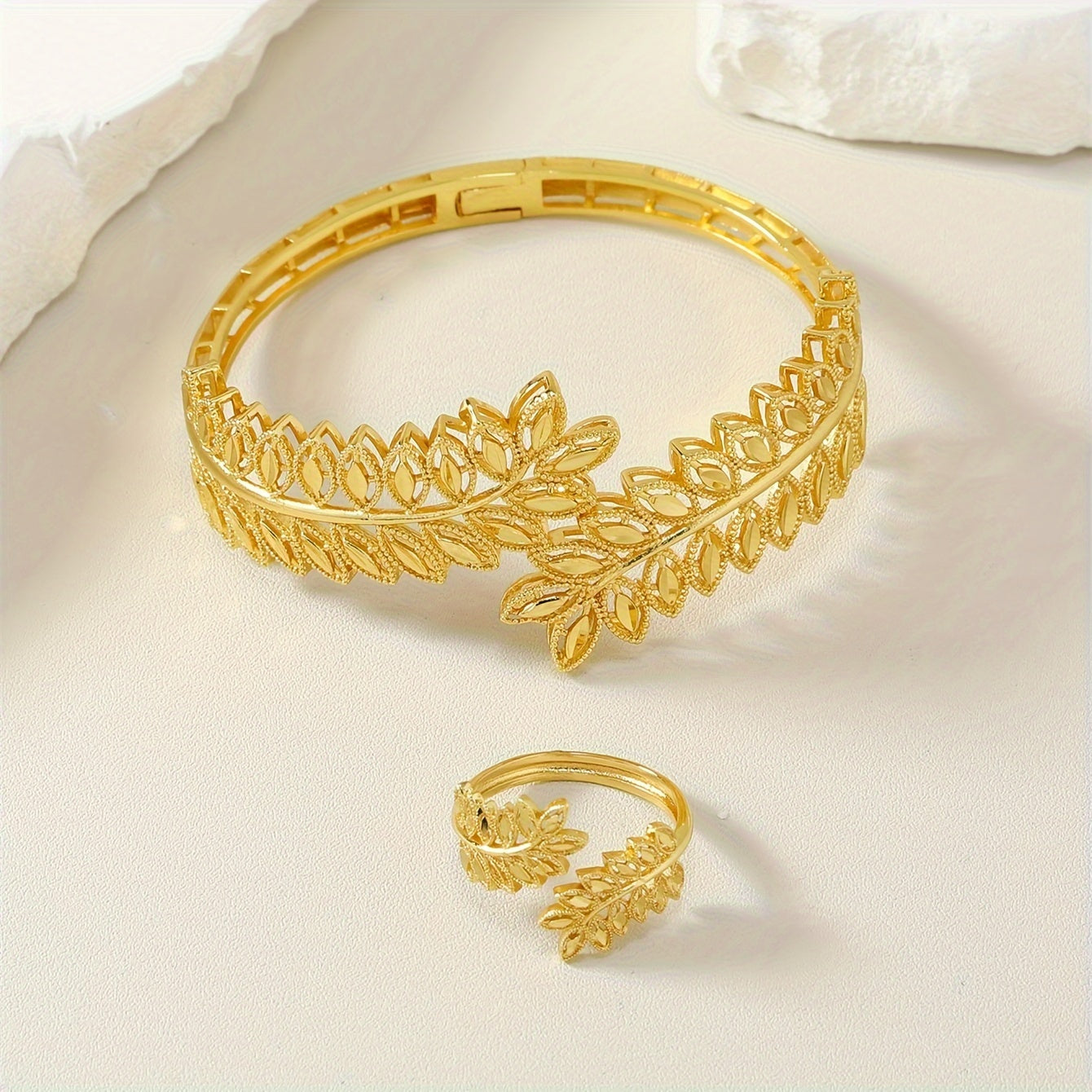 Wedding bride sleeve hand decoration set featuring a 24K gold plated light luxury leaf design, perfect for Middle East Ramadan celebrations. Includes a stunning bracelet and matching ring.