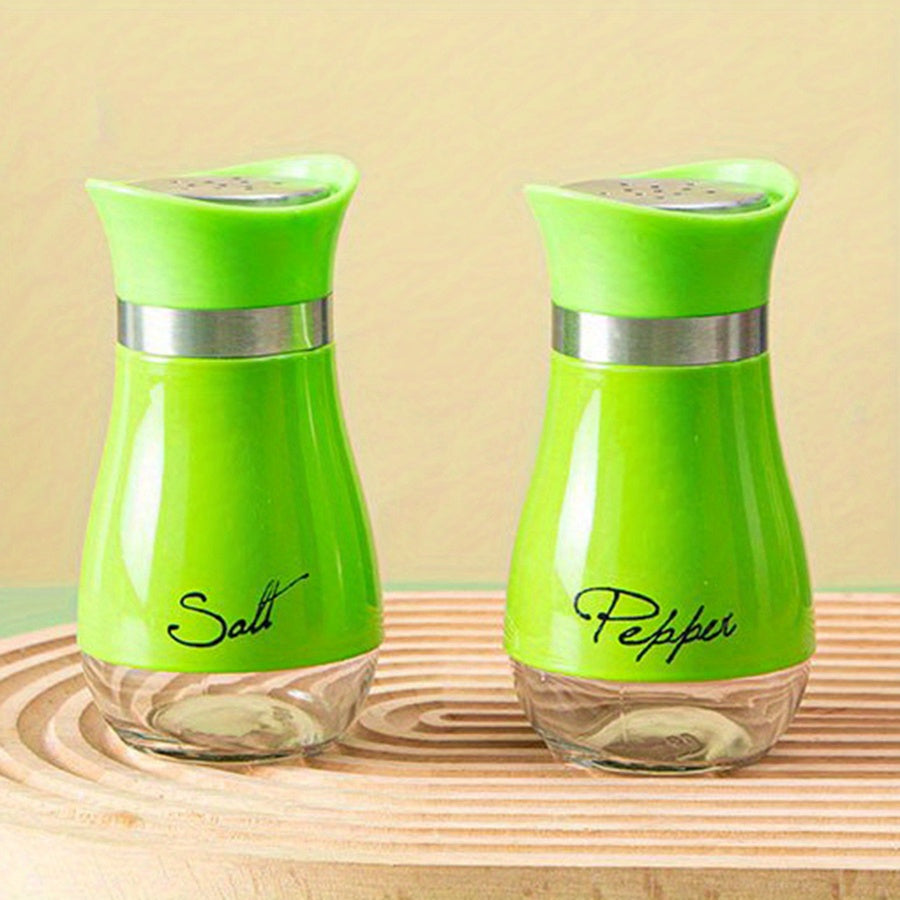 Set of two 3.4oz salt and pepper shakers for kitchen use.