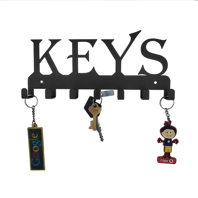 Black metal key holder with decorative hooks for organizing coats, hats, and more. Wall-mounted storage rack for home and hallway. Rust-proof design.