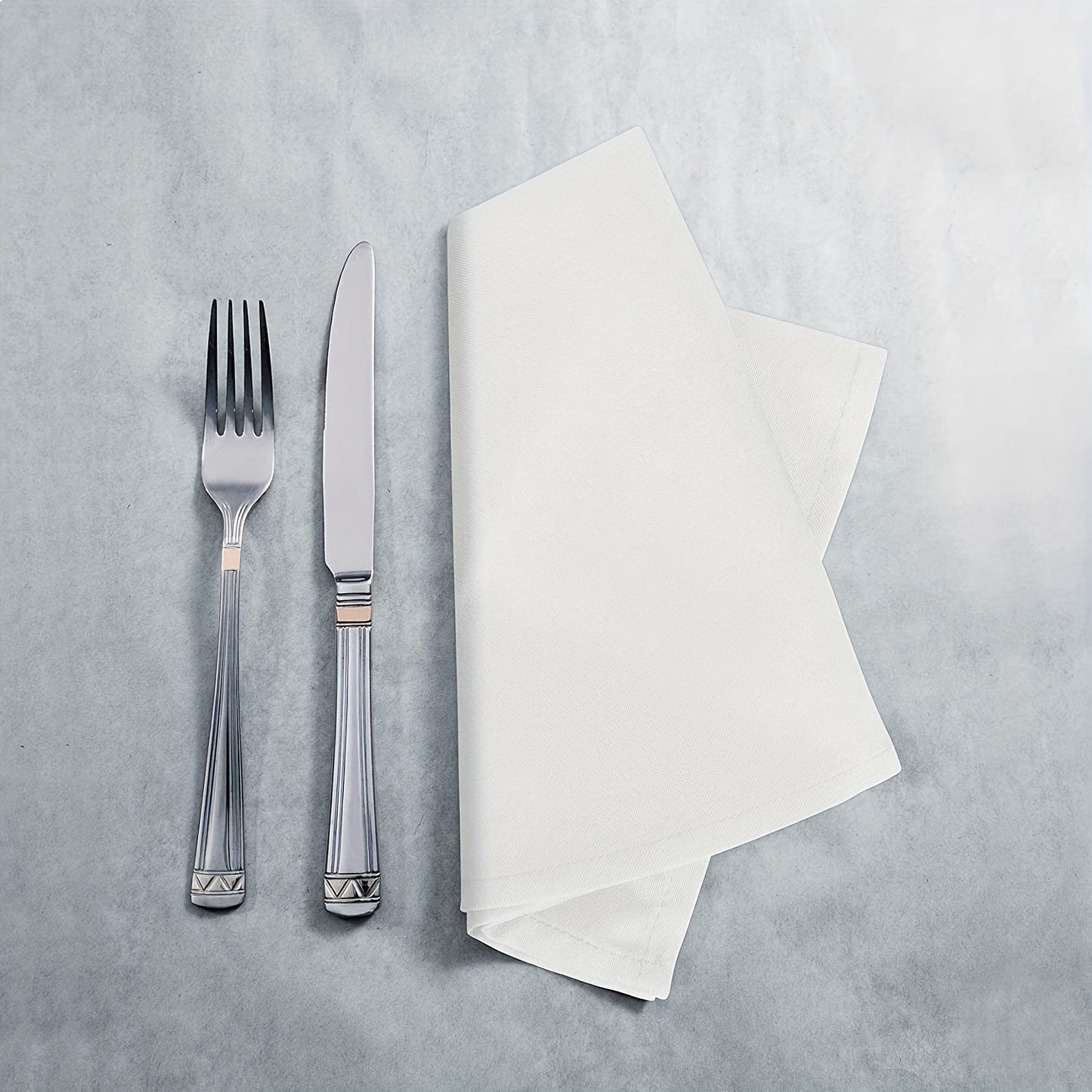 12 elegant white polyester cloth napkins, oversized, square, double folded with hemmed edges. Perfect for dining, restaurants, weddings, Thanksgiving & Christmas. Smooth texture, easy to care for.