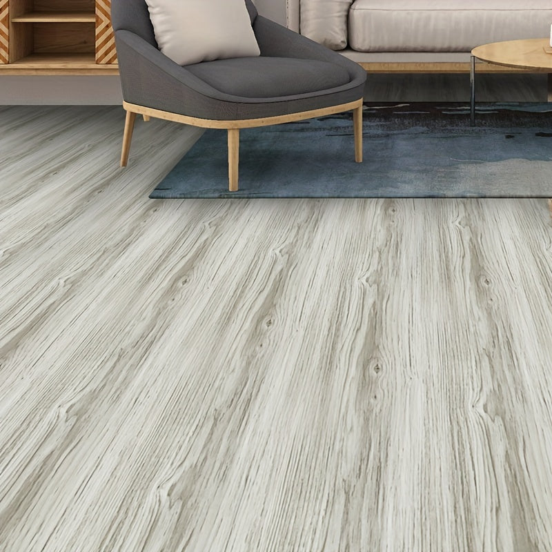 Self-adhesive floor tile sticker with durable faux wood grain design - perfect for enhancing the decor of your office or bedroom. This waterproof and non-slip sticker is designed to last.