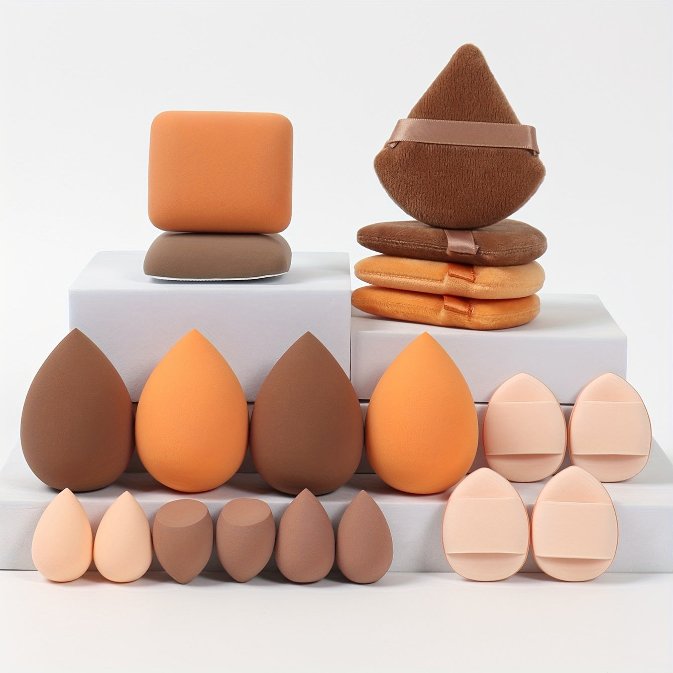 A 20-piece candy set includes various beauty sponges for blending makeup and covering imperfections. Latex-free and suitable for all skin types.