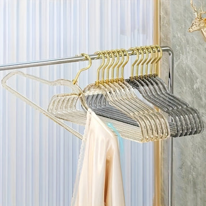 A set of 12 premium acrylic hangers with a non-slip, sparkling transparent design, providing a firm grip for wardrobe storage. These durable, thick hangers are perfect for bedroom closets, offering a traceless hanging solution.