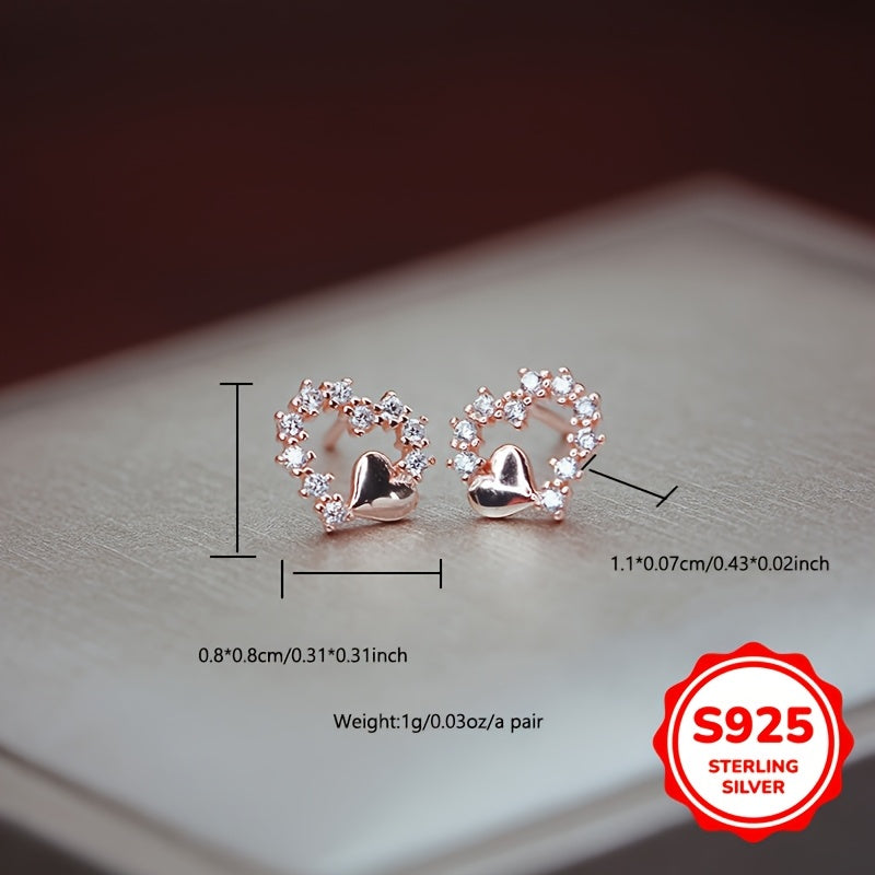 These graceful heart-shaped earrings are crafted from S925 silver with synthetic zirconia stones. Their simple and minimalist design is perfect for girls who prefer a cool and elegant style. These versatile earrings make a great gift for birthdays or