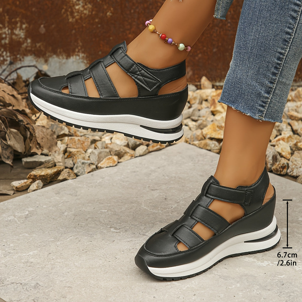 Stylish wedge sandals with hidden height, thick sole and hook-and-loop closure for comfort and versatility.