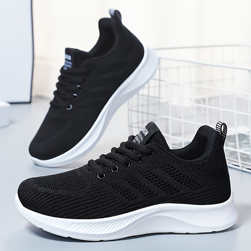 Women's breathable running sneakers with lightweight design, lace-up closure, comfortable fabric, PVC sole, and round toe for outdoor training.