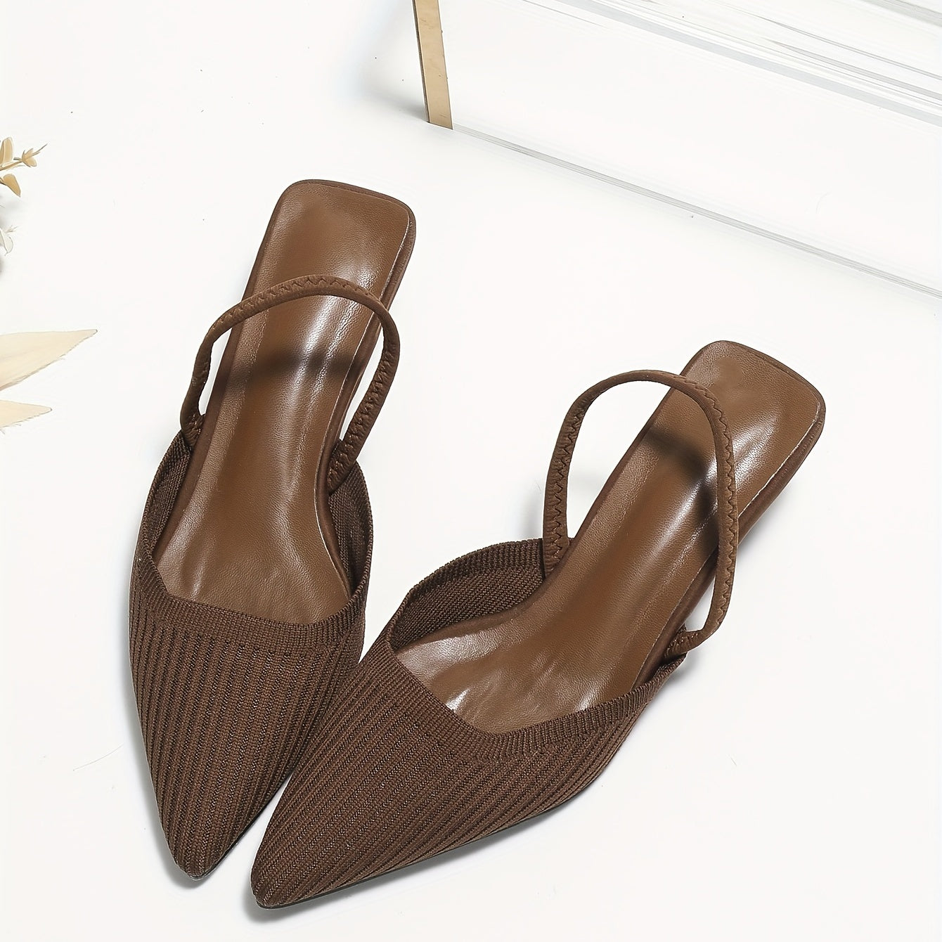 Solid color knit mules for women with flared heel and slingback style, featuring a trendy point toe design for comfort.