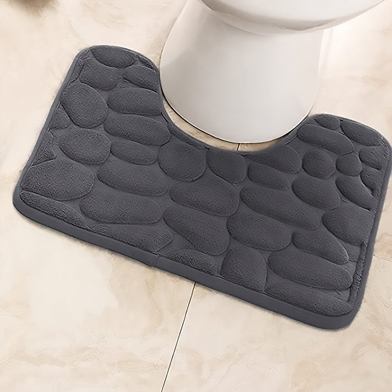 Soft and absorbent memory foam bathroom mat with non-slip backing. Machine washable and quick-drying. Suitable for bathroom, kitchen, laundry, bedroom, and shower.