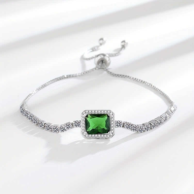 An elegant and luxurious women's bracelet featuring dazzling green Zirconia stones, crafted in adjustable 925 silver weighing just 4.3g. Perfect for daily wear, special occasions, and gifting, especially for Middle Eastern events.