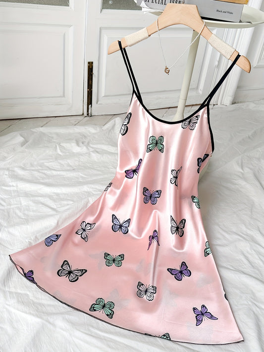 Satin nightgown with butterfly print and adjustable cross straps, perfect for women's sleepwear.