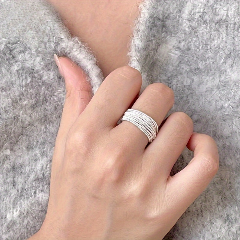 Elegant and light-weight, this open design multi-line ring for women is made of 925 silver and features a simple Korean style. In a beautiful golden color, this hand accessory weighs just 5g/0.18oz.