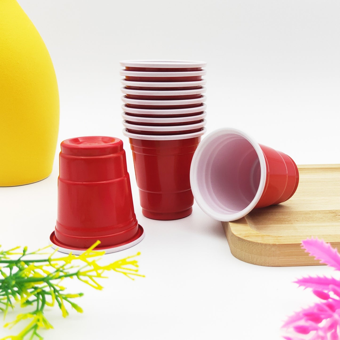 50 two-tone 2oz plastic party shot cups for various occasions like weddings, banquets, parties, and outdoor events.