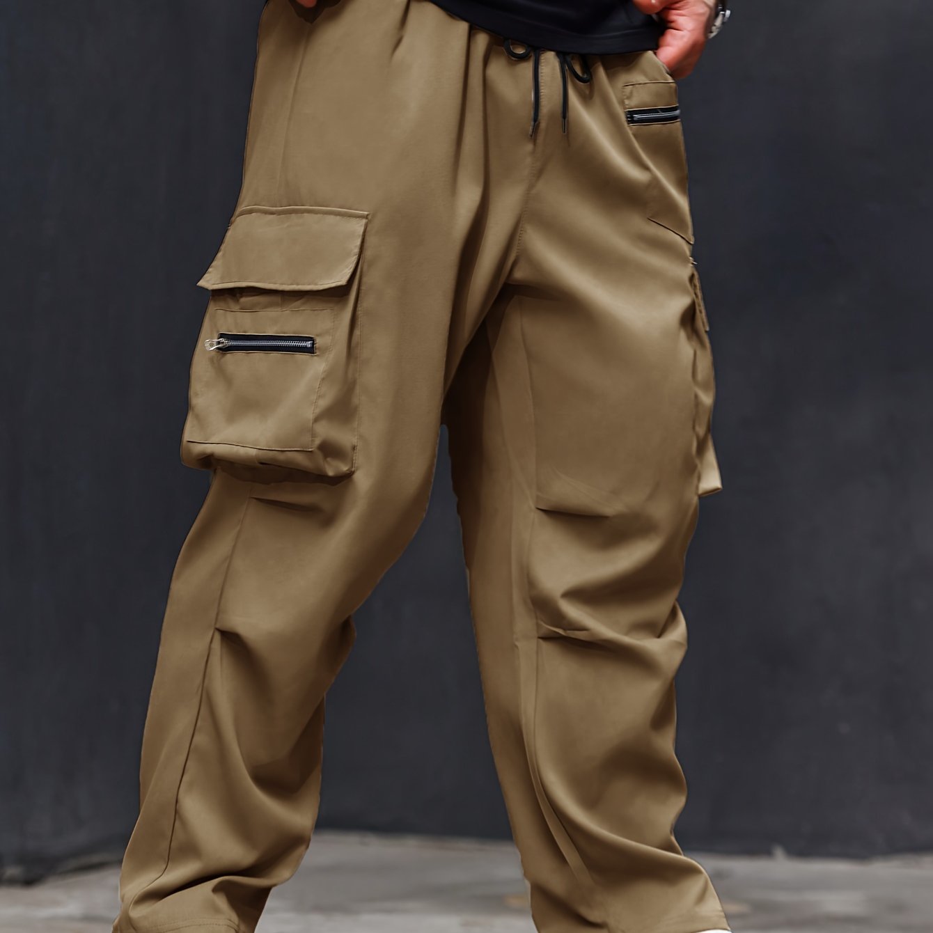 Plus size men's cargo pants with athletic and casual style, regular fit and pockets.