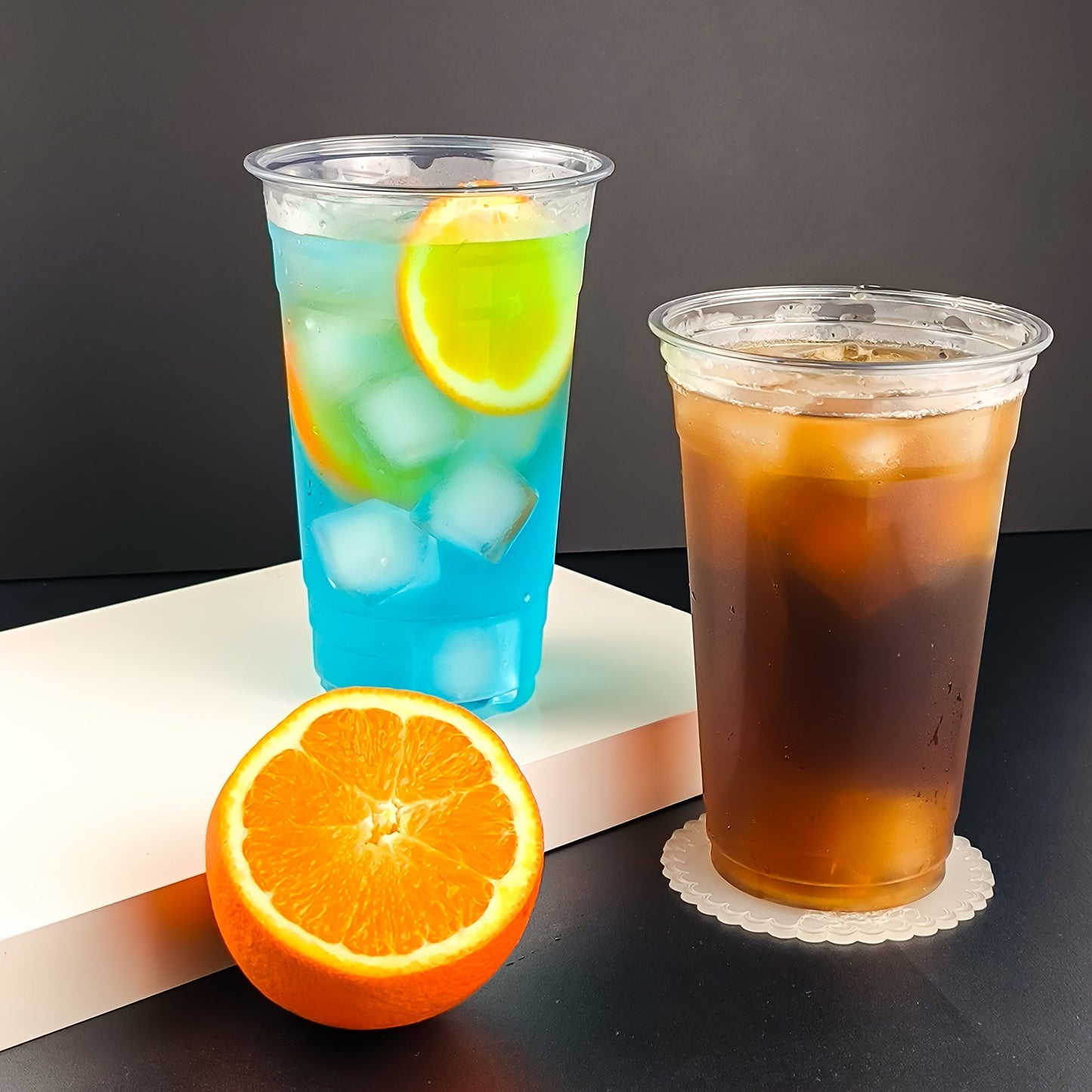 Get 25 sets of 24oz clear plastic cups with lids and straws, made from PET material. These cups are perfect for iced coffee and cold drinks, great for summer, outdoor events, and on-the-go drinkware.