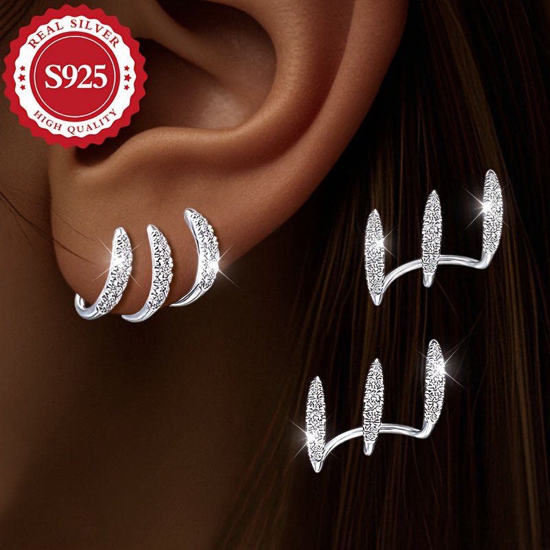 A set of exquisite S925 Sterling Silver earrings with claw-set Zirconia studs - dazzling, hypoallergenic, suitable for all occasions, great as a gift, unique design, perfect for the holiday season.