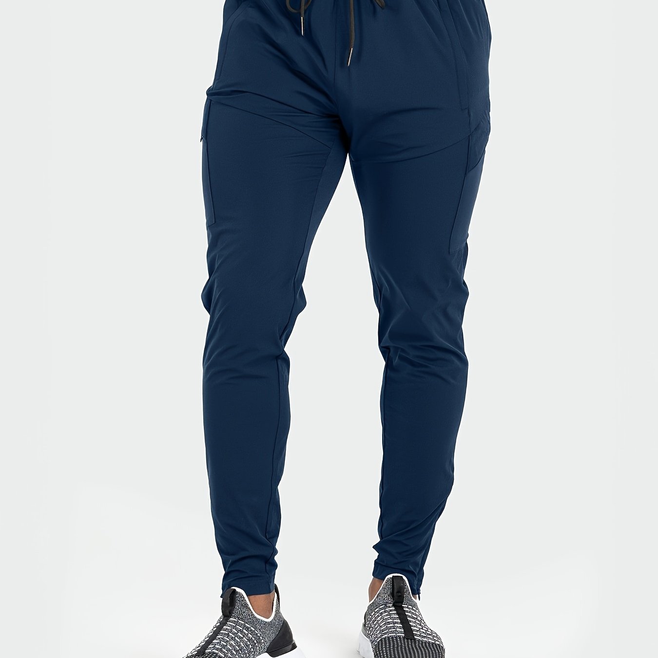 Men's athletic joggers with drawstring waist, made of 90% polyester and 10% elastane. Ideal for running, training, hiking and outdoor activities. Regular fit, tear-resistant, slight