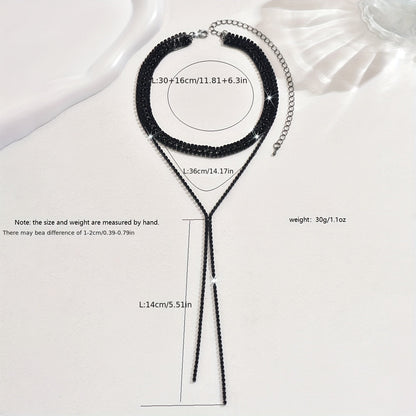 Elegant and luxurious, this black and white tassel necklace features shiny rhinestones, making it the perfect accessory for bridal events and weddings. Delicate and stylish, this multi-layer necklace is an ideal gift for any occasion.