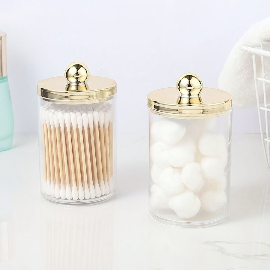 3-piece Qtip holder with tray, acrylic apothecary jars and lids for bathroom storage.