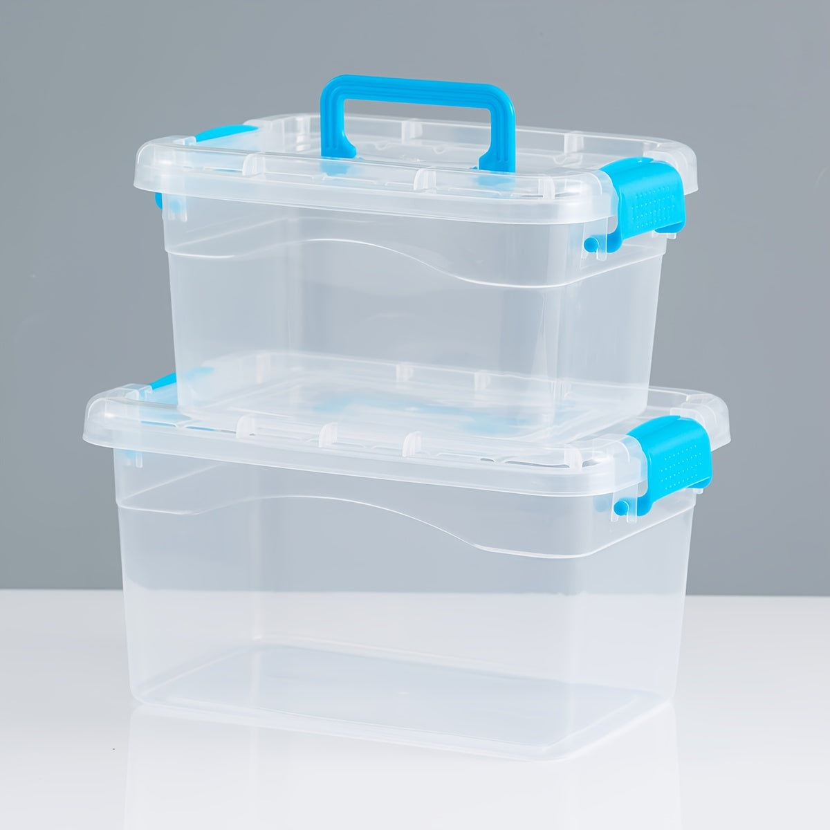 Set of 2 plastic storage boxes with lids, ideal for various items in bathroom, stationery, toys, etc. Dustproof and moisture-resistant. Mixed colors.