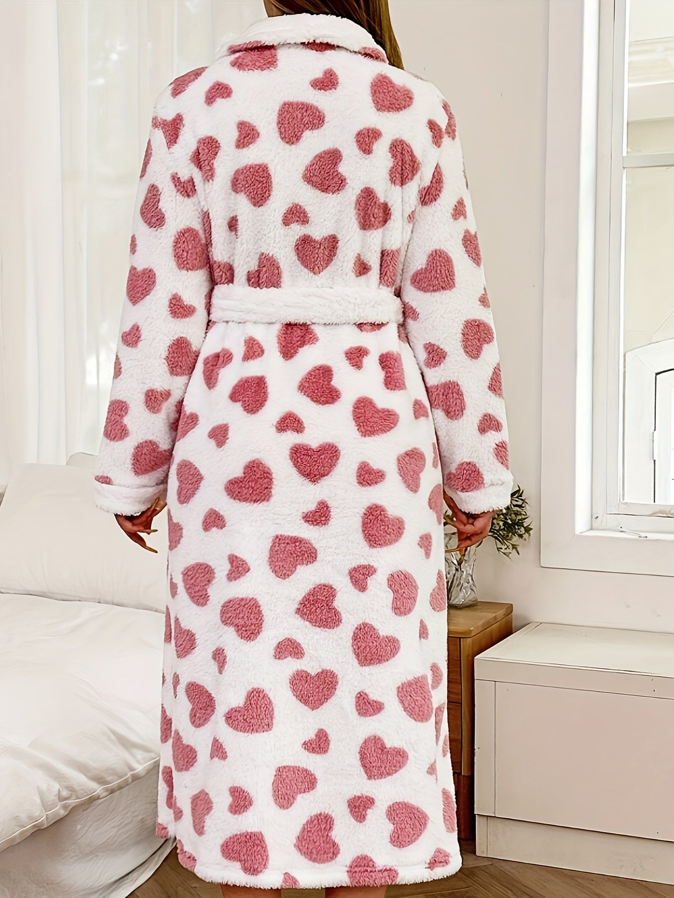 Women's plus size casual robe with heart pattern, long sleeves, and belt. Made of warm flannel for fall and winter loungewear.