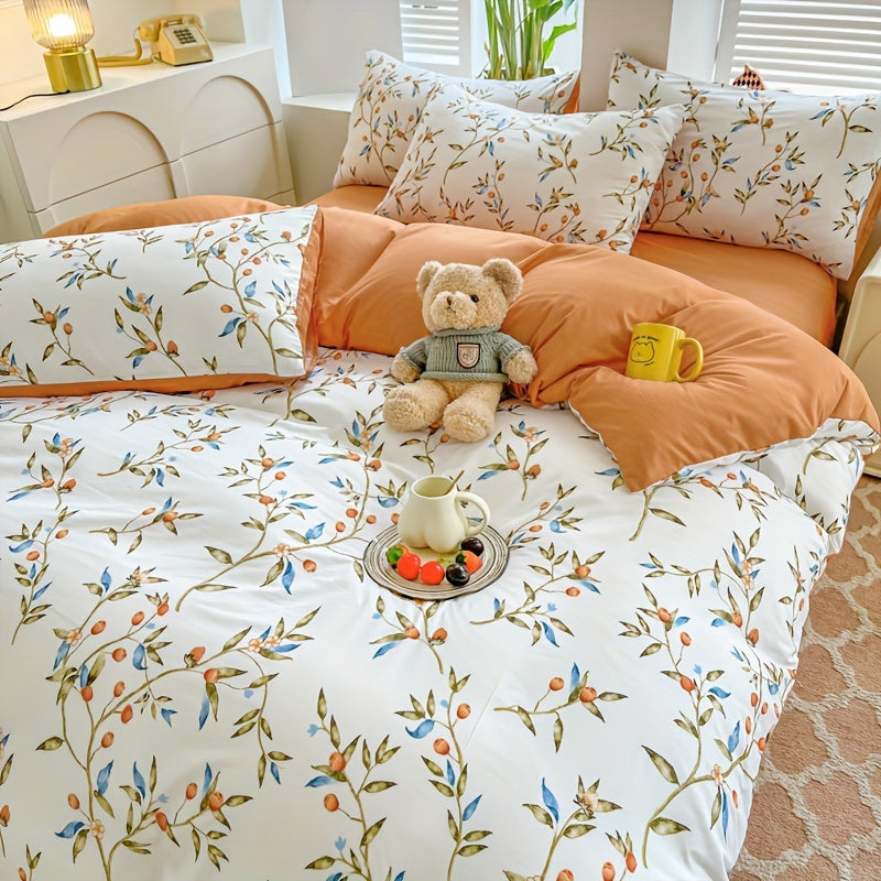 Orange flower and fruit plant pattern quilt cover set includes 1 quilt cover and 2 pillowcases in a pastoral style. Made from comfortable and skin-friendly material, it is non-ball and can be machine washed. Available in single, double, standard, and