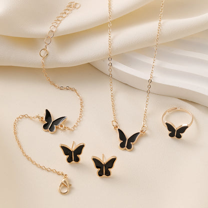 4-piece Elegant Butterfly Jewelry Set for Women, includes necklace, ring, earrings, and bracelet. Versatile fashion accessories for all occasions, perfect for gifting.