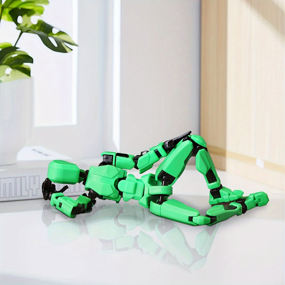 Articulated robot action figure toy with colorful design and durable material. Perfect gift for creative play.