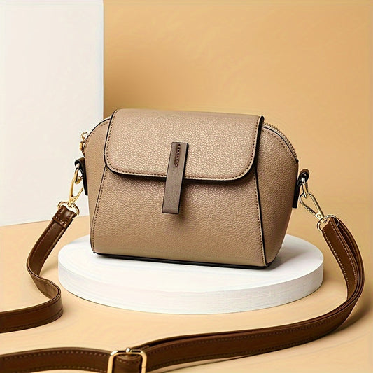 Chic mini crossbody bag featuring two-tone design, adjustable strap, zipper closure, golden hardware. Ideal for daily commute and travel. Mixed color design with neat stitching, small size.